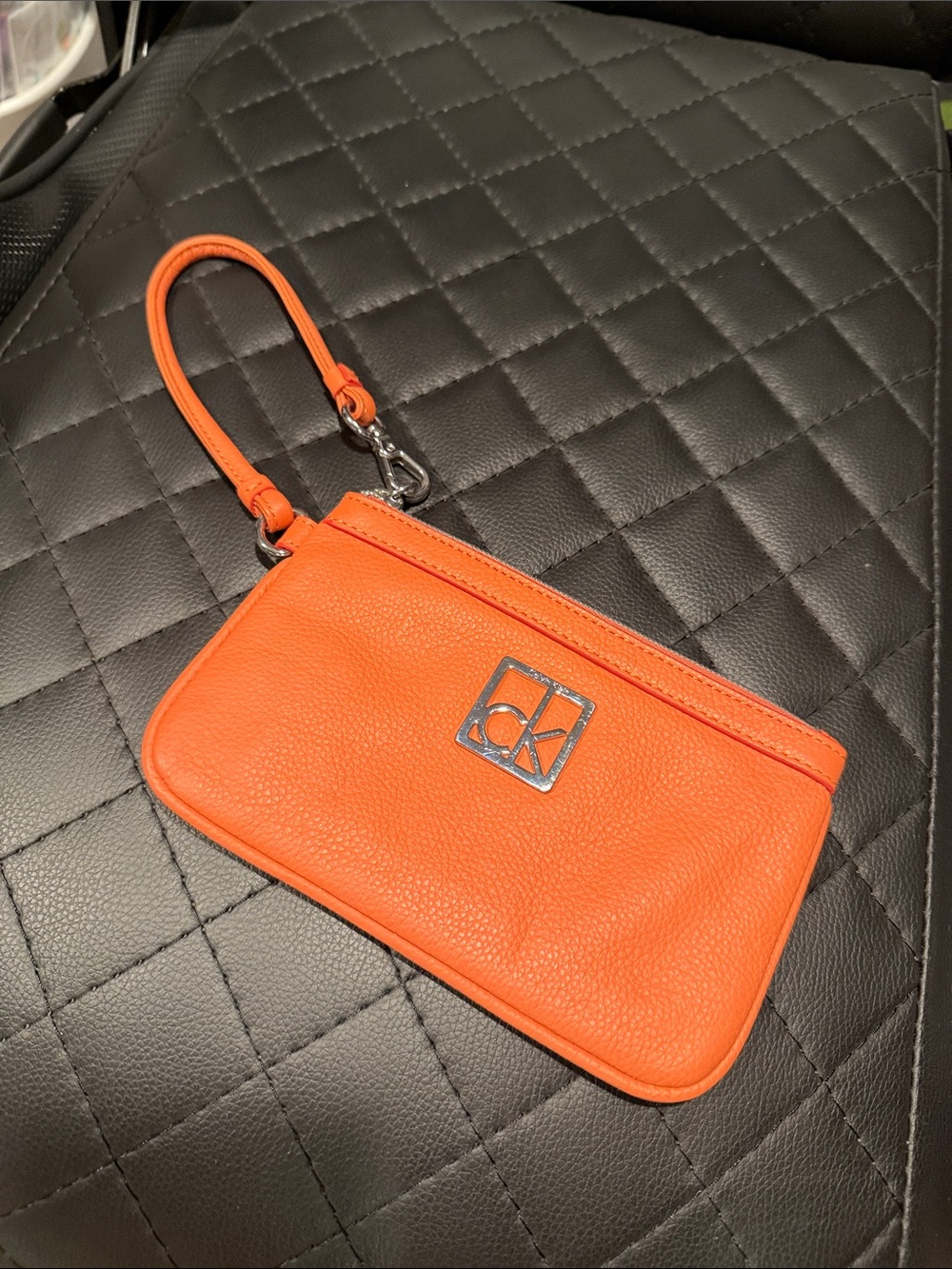 Calvin Klein Orange Pebbled Leather Wristlet Clutch with Silver Logo